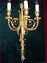 Pair of three lights wall sconces