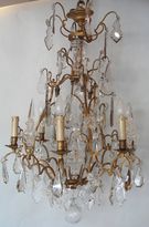A Louis XV style so called "cage" giltbronze and cristal chandelier.