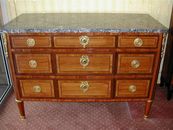 A Louis XVI period marqueterie chest of drawers 