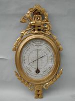 Baromètre en bois sculpté et doré aux attributs de la Moisson d'époque Louis XVI, XVIIIème.