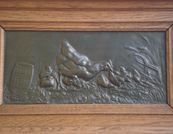 Pair of bronze panel signed Cain