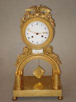 Directoire gilt bronze skeleton clock